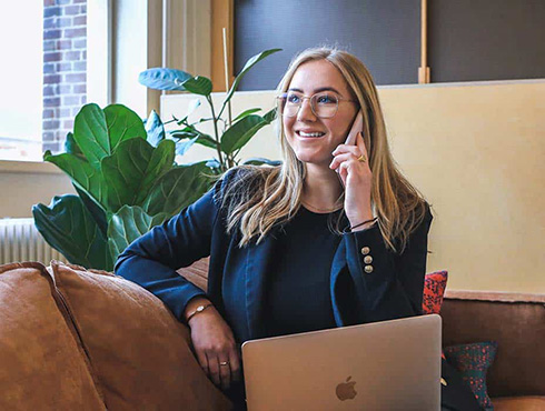 woman in office on phone