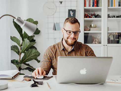 man at home office