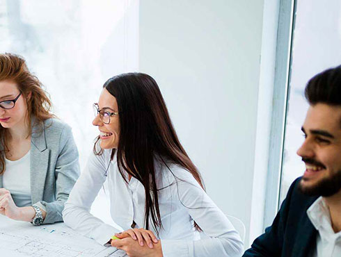 three workers in meeting