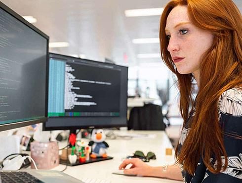 woman looking at monitor