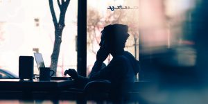 silhouette of woman and laptop