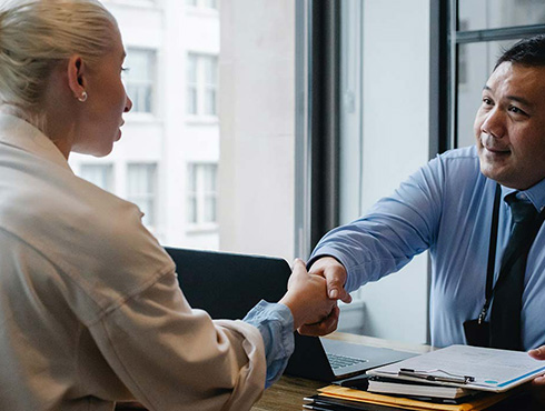 two people shaking hands