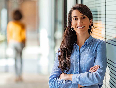 smiling woman in blue shirt