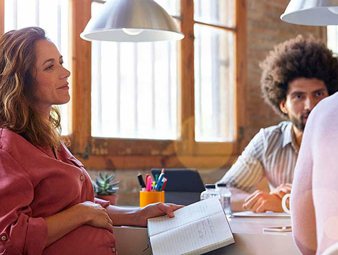 workers discussing diversity goals