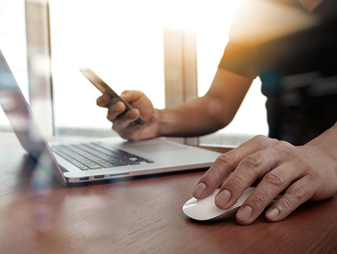 worker using laptop