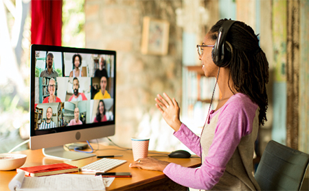 person participating in remote meeting