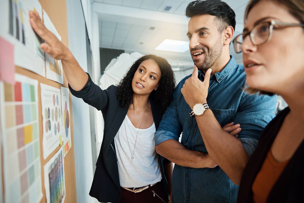 workers studying graphics