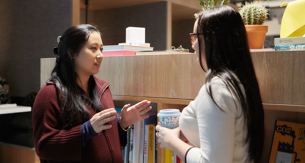 two women meeting in office