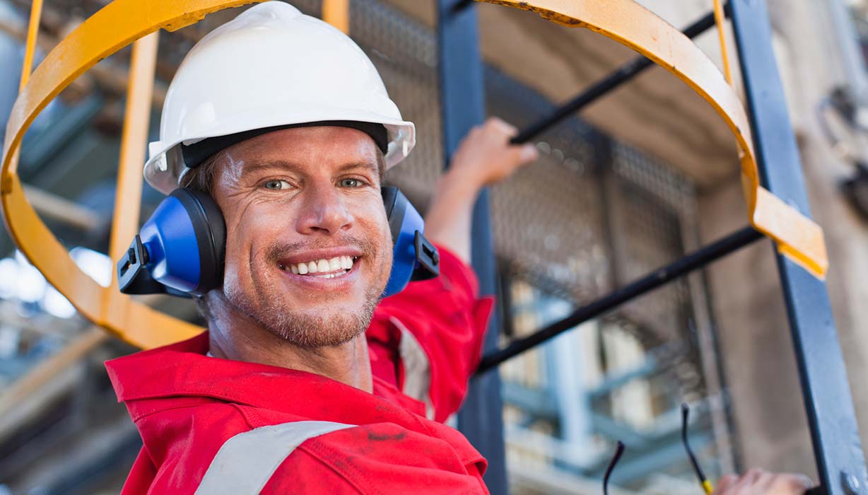 utility worker climbing ladder