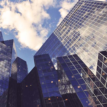 view of tall buildings taken from street