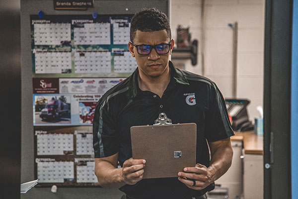 man holding clipboard