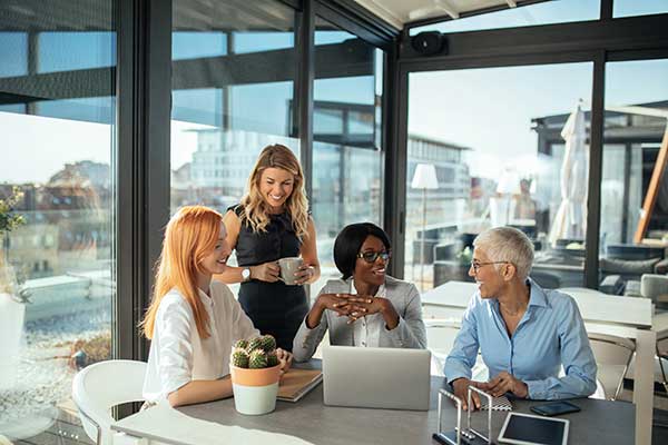 co-workers sitting at table