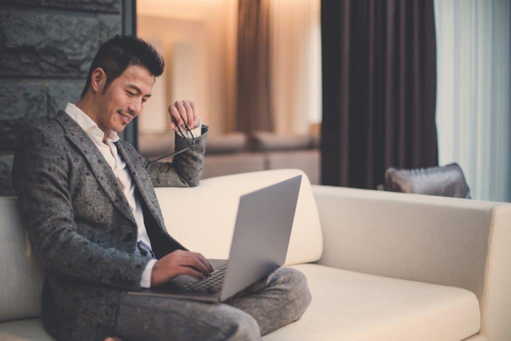 Modern businessman using laptop