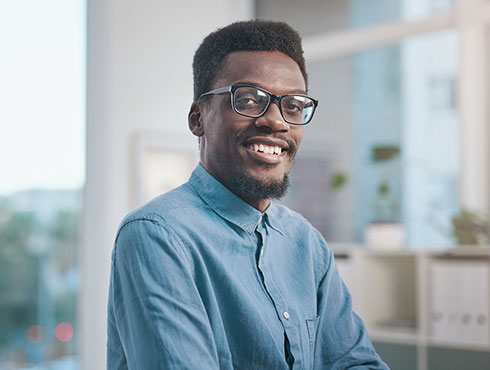 smiling man in an office